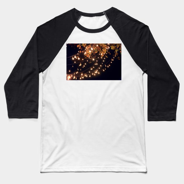 Lights draping off the Tree with a Black Sky in the background Baseball T-Shirt by Design A Studios